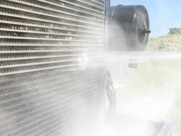 Steam cleaning industrial radiator